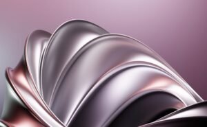 A captivating abstract image showcasing sleek metallic curves with a soft, elegant lighting effect.